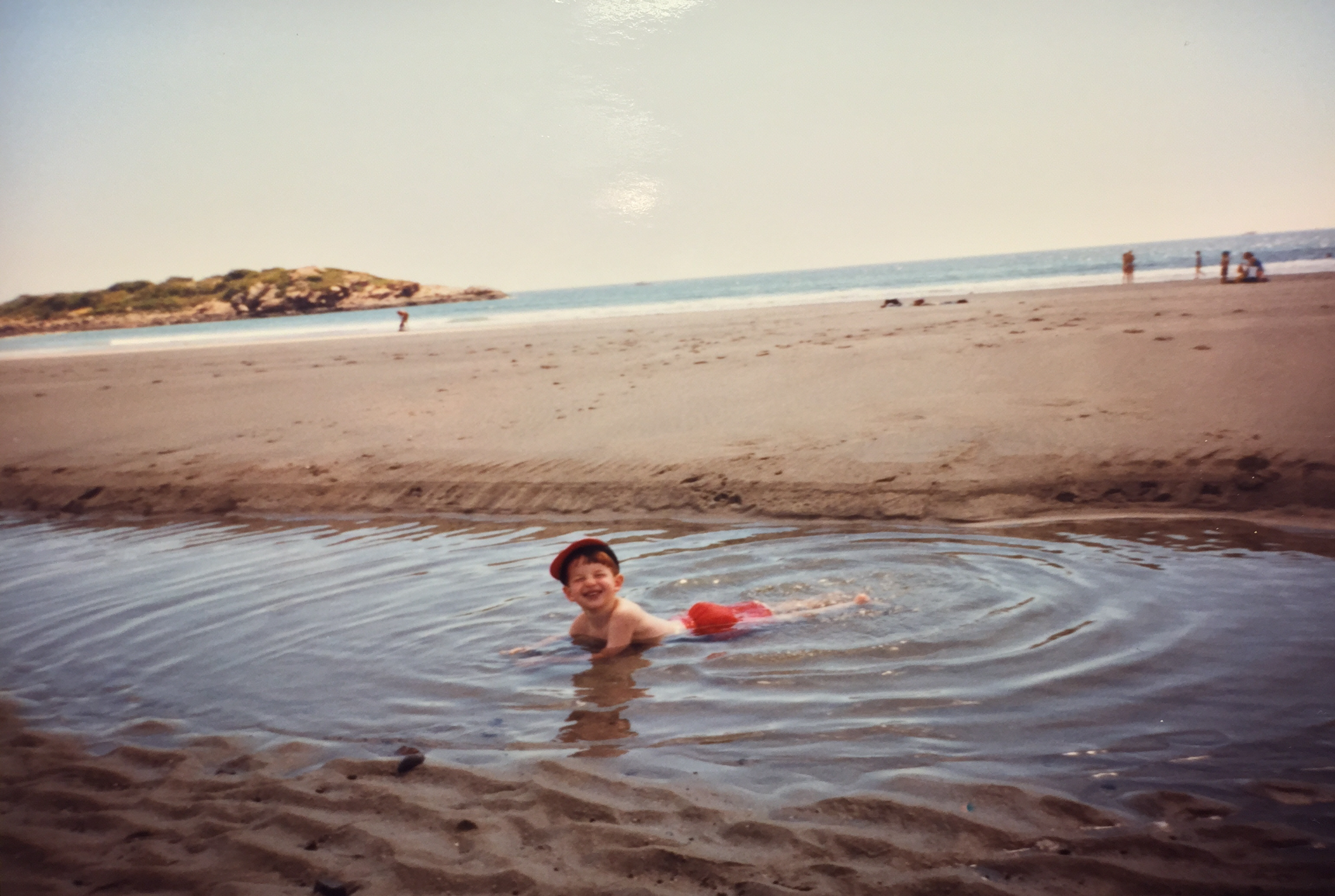 Kids love the warm water of the tidal pools at Good Harbor Beach. Great view of Salt Island.
